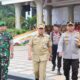 Kapolres Rohul Dampingi Bupati Di Apel Akbar Linmas Pasukan Pengamanan TPS Pemilu 2024